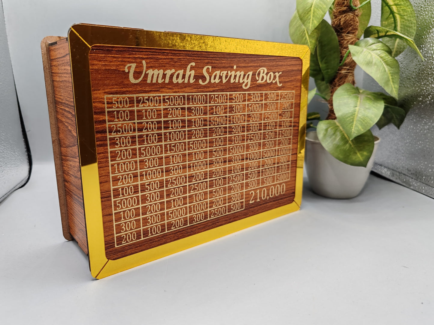 1.Umrah Saving Box